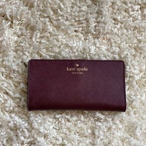 Kate Spade - plum folding wallet